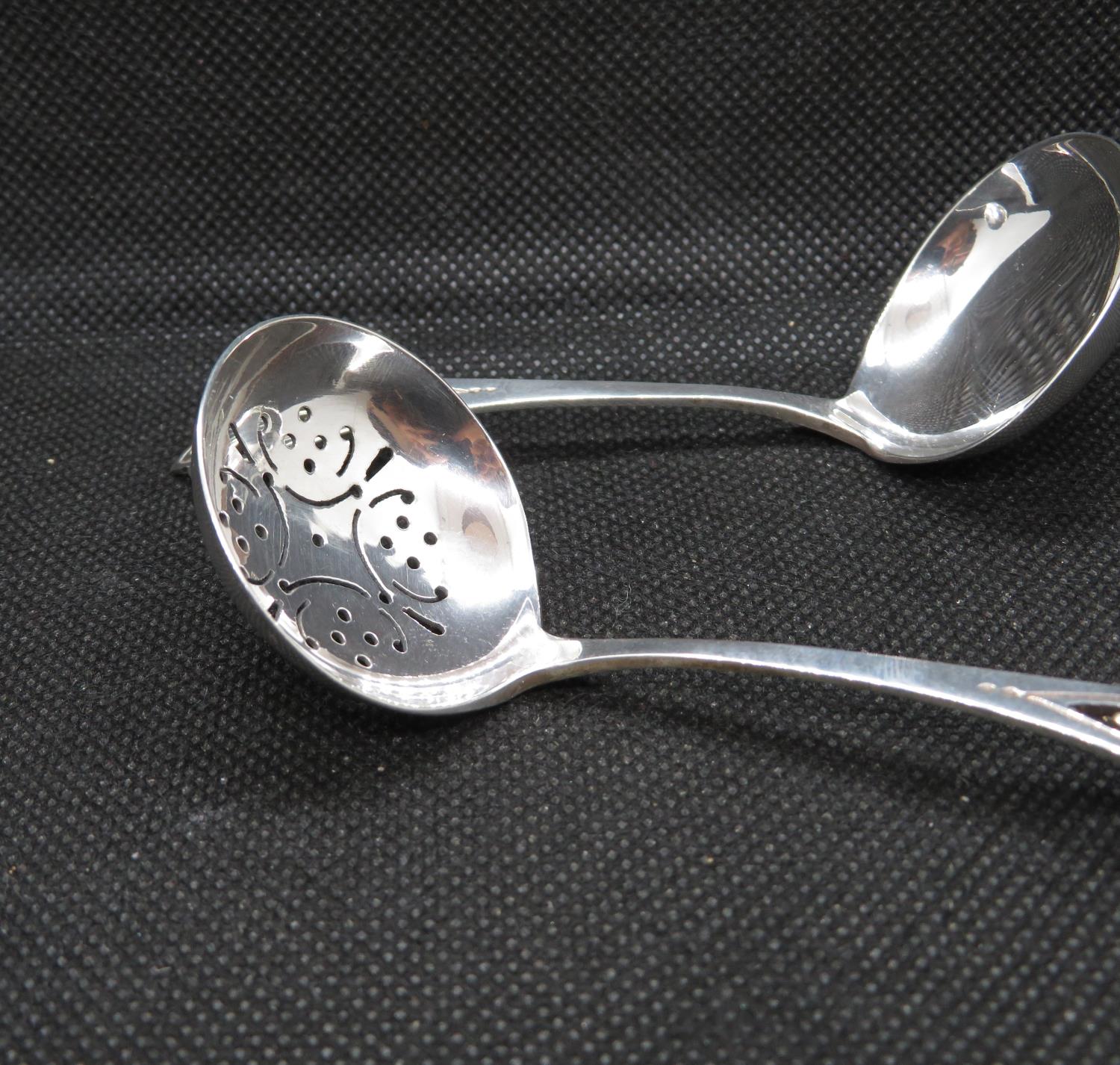 Scottish silver sugar sifters with hand pierced thistle finial and matching sauce ladle 34g. - Image 2 of 3