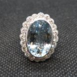 18ct ladies gold and platinum aquamarine diamond ring. Oval aquamarine est. weight 8cts.