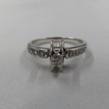 18ct HM diamond ring main stone 0.11ct with small chippings on edge total weight 4.2g