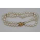 Double row cultured pearl bracelet with 9ct gold clasp 7.25"