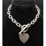 HM silver bracelet with T bar and heart tag