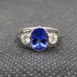 Tanzanite diamond and platinum ring set with 2x 0.2 ct brilliant cut diamonds and tanzanite size M