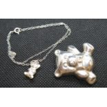 Tiny teddy bear pendant on 16" chain and large silver teddy bear brooch