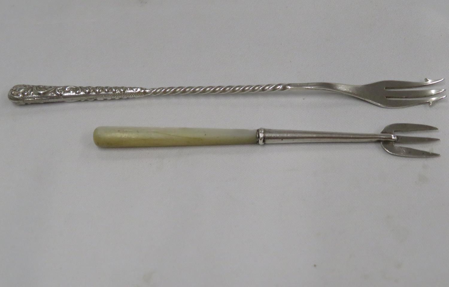 Victorian silver sweetmeat fork by William Devenport Birmingham 1899 and another by Charles Perry