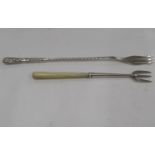 Victorian silver sweetmeat fork by William Devenport Birmingham 1899 and another by Charles Perry