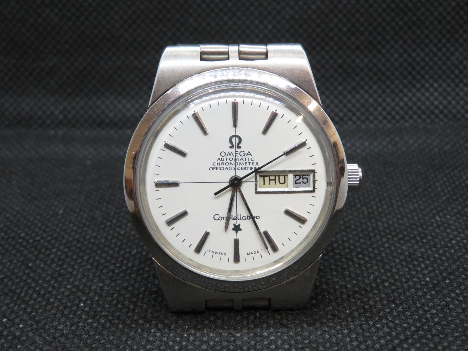 Omega Constellation day/date approx 1971 with cross hair dial with original Omega strap sterling