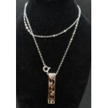 Rose gold on silver pendant in style of Charles rennie Mackintosh on 18" silver trace link chain