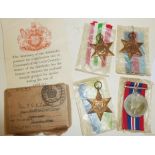 4x WWII Naval medals in original packaging with awards and letter