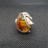Silver ring cabochon set with Baltic Amber size K