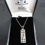 Charles Rennie style pendant set with Marquis cut blue topaz on 18" chain in box 6.5g