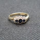 9ct gold sapphire and diamond triple cluster ring size K1/2 3.1g