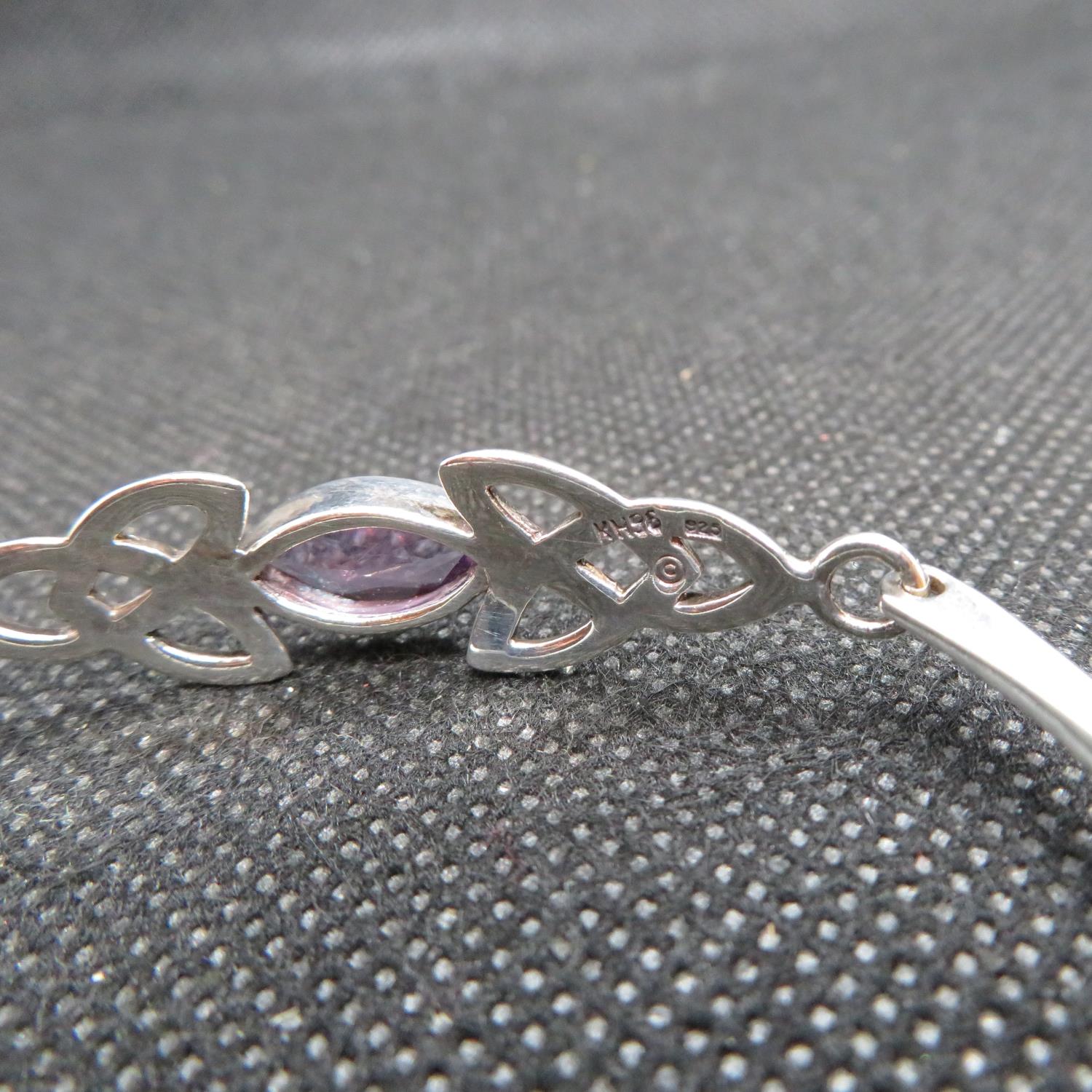 Silver Celtic style bangle by Kit Heath designs stamped KH 96 set with marquis amethyst stone 9.7g - Image 2 of 2