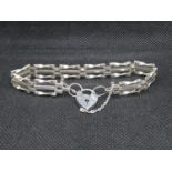 Silver 3 bar bracelet with lock and chain London 1978 11.4g