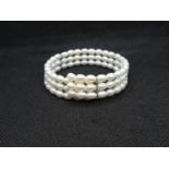 Silver and freshwater pearl bangle stamped 925