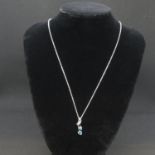 Silver HM aquamarine and diamond pendant on 18" chain stamped 930DIA