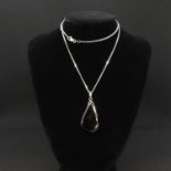 Modernist silver pendant with black onyx on silver chain