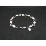 Silver and pink mother of pearl bracelet by Next