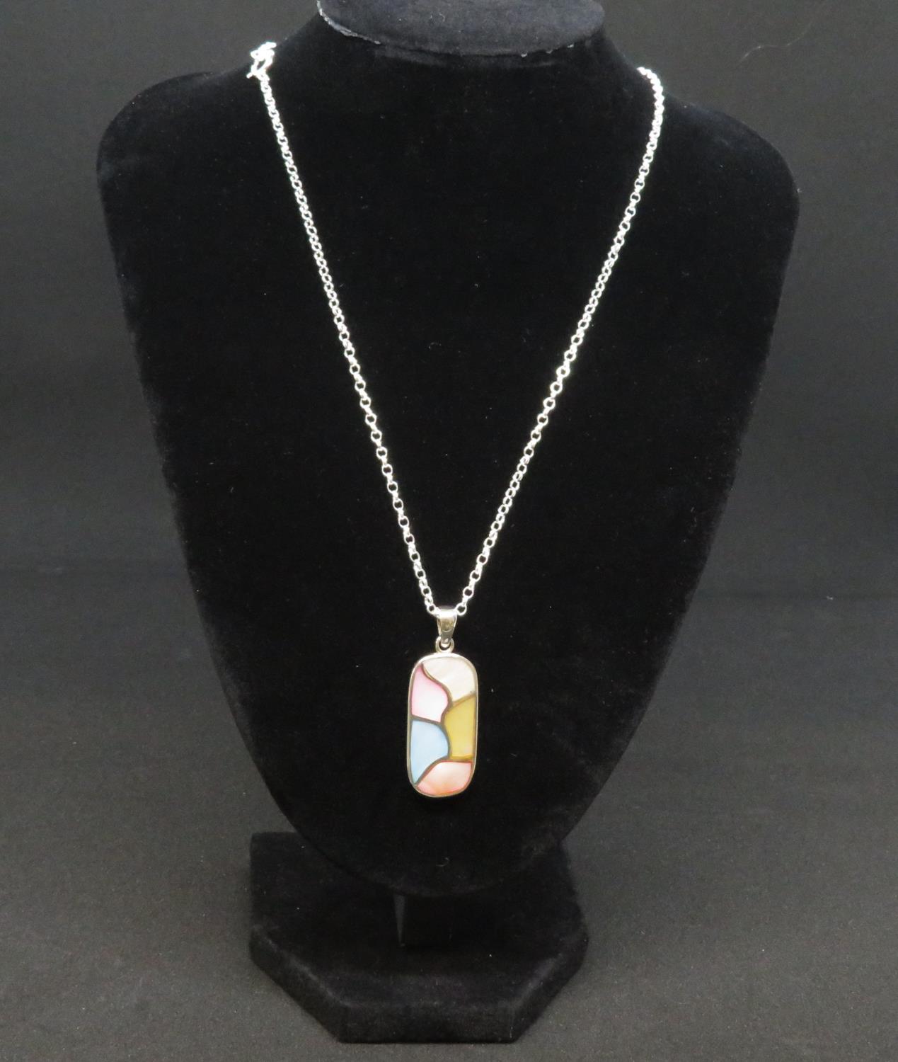 Silver and mother of pearl pendant on 17" silver chain stamped 925 15.2g