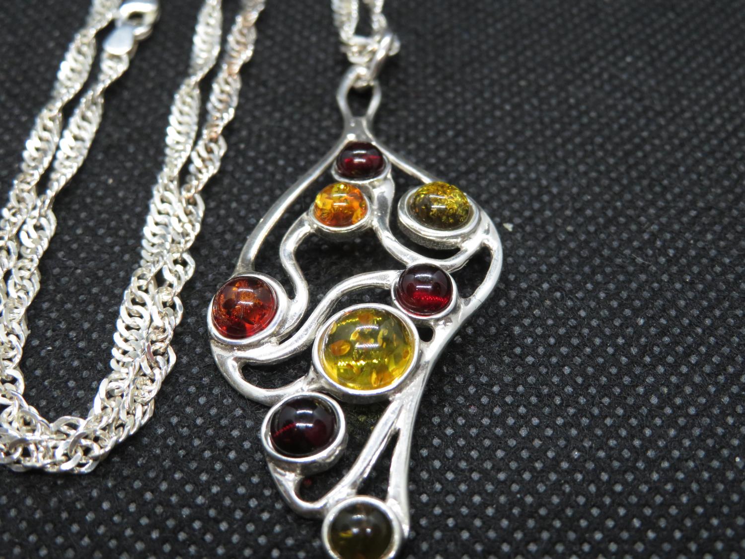 Modernist silver pendant set with Baltic Amber on 24" silver curb link chain 13.8g - Image 2 of 2