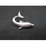 Silver dolphin brooch
