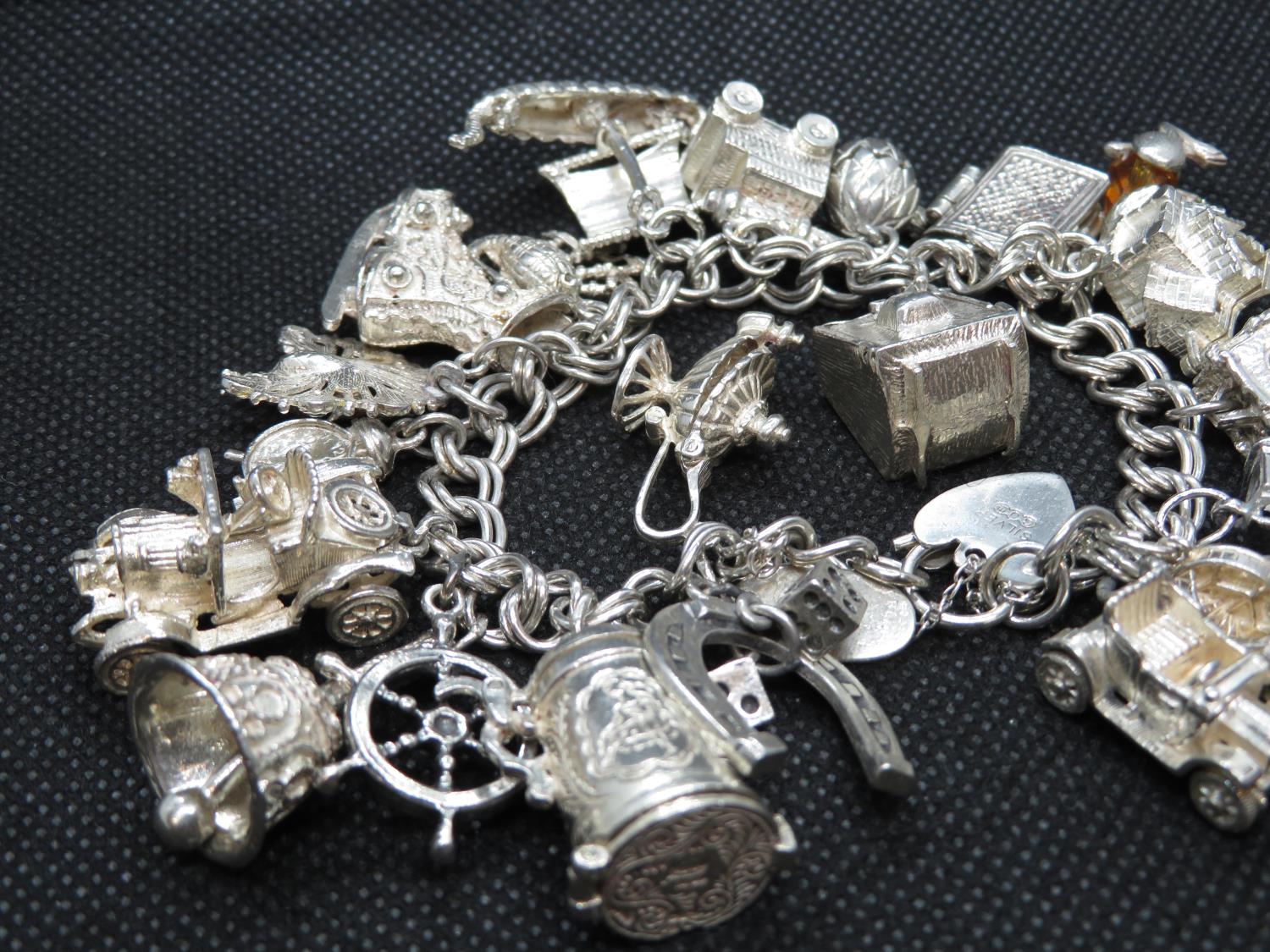 George Jensen vintage silver bracelet with 21 unusual and rare charms GJ Ltd. HM London 1972 116.4g - Image 2 of 2