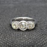 Antique platinum ring MILLEGREIN set with 3 old cut diamonds total weight in excess of 1.5cts size M