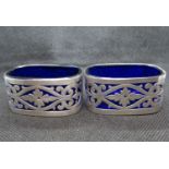 Nice pair of Edwardian pierced salts with blue glass liners Birmingham 1903