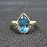 9ct gold ring heavy set with briolette cut London topaz and two small diamonds size N