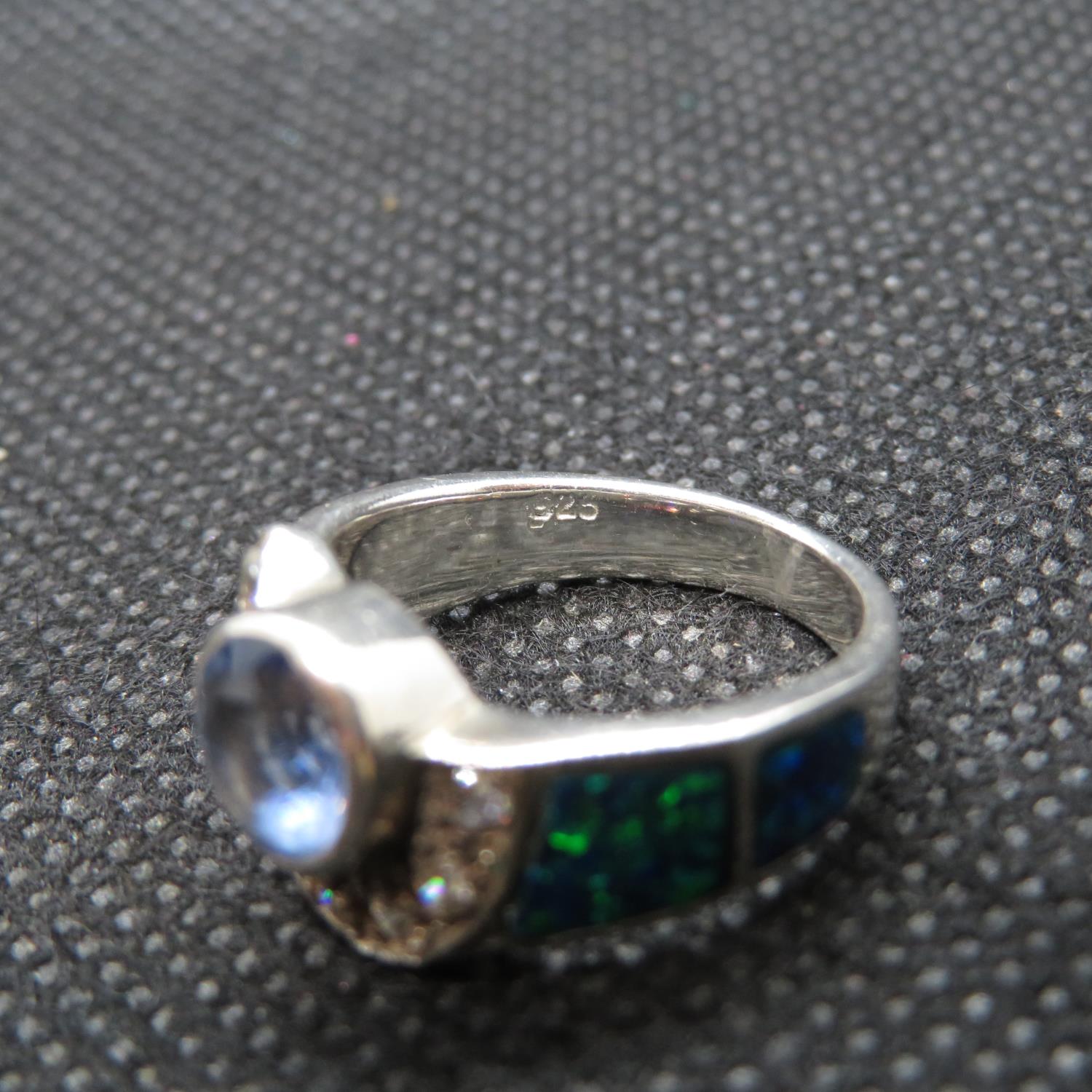 Silver abstract ring set with blue topaz cubic Zirconia and black opal 5g - Image 2 of 2