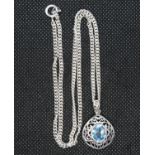 Pierced silver pendant set with blue topaz stone on 18" silver curb chain 13.7g