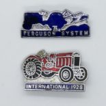 2x enamel 1920's tractor badges