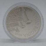 Silver £5.00 in capsule