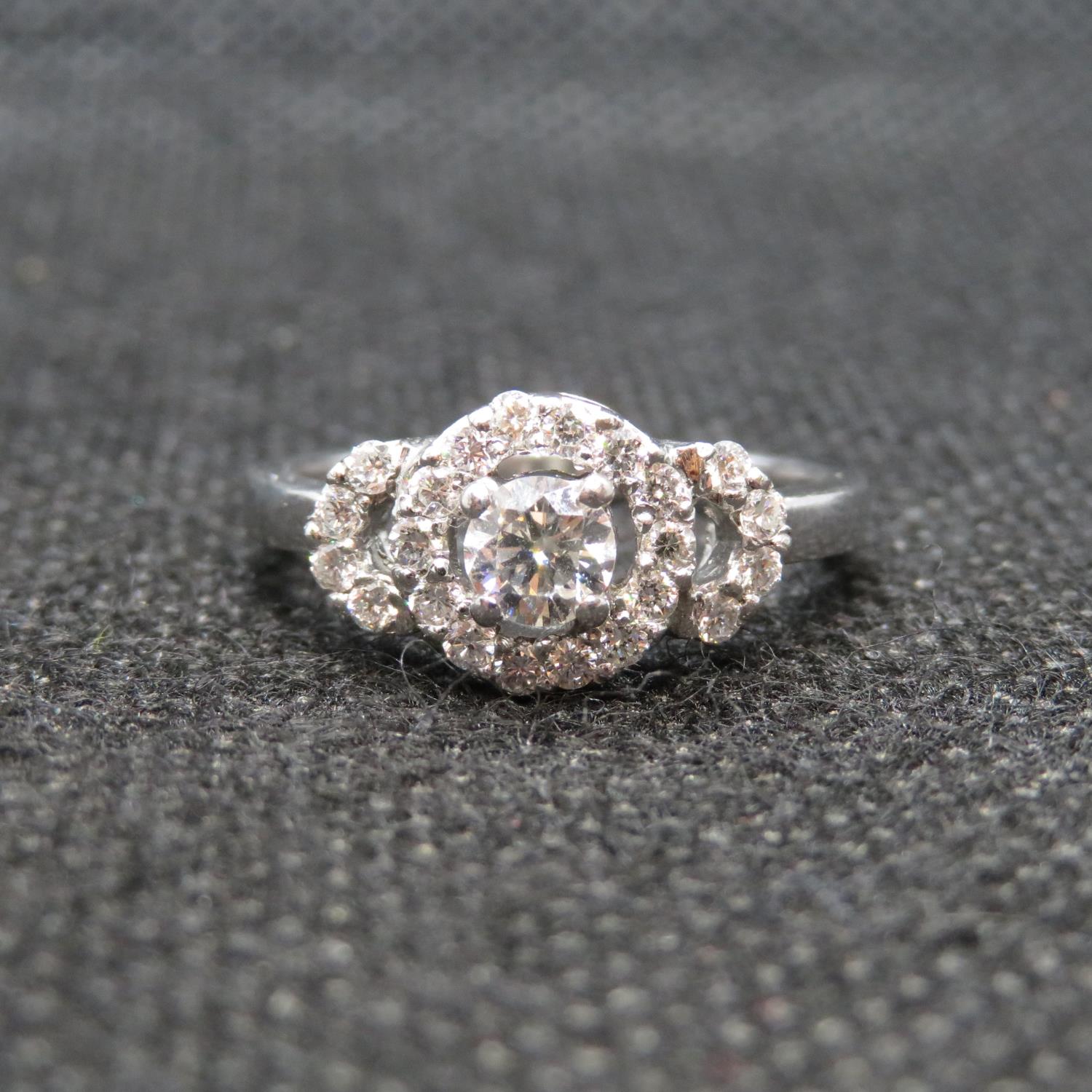 Platinum triple halo diamond ring with .75ct white brilliant cut diamonds size M 5.4g