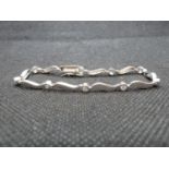 HM silver wave bracelet set with white stones 7"
