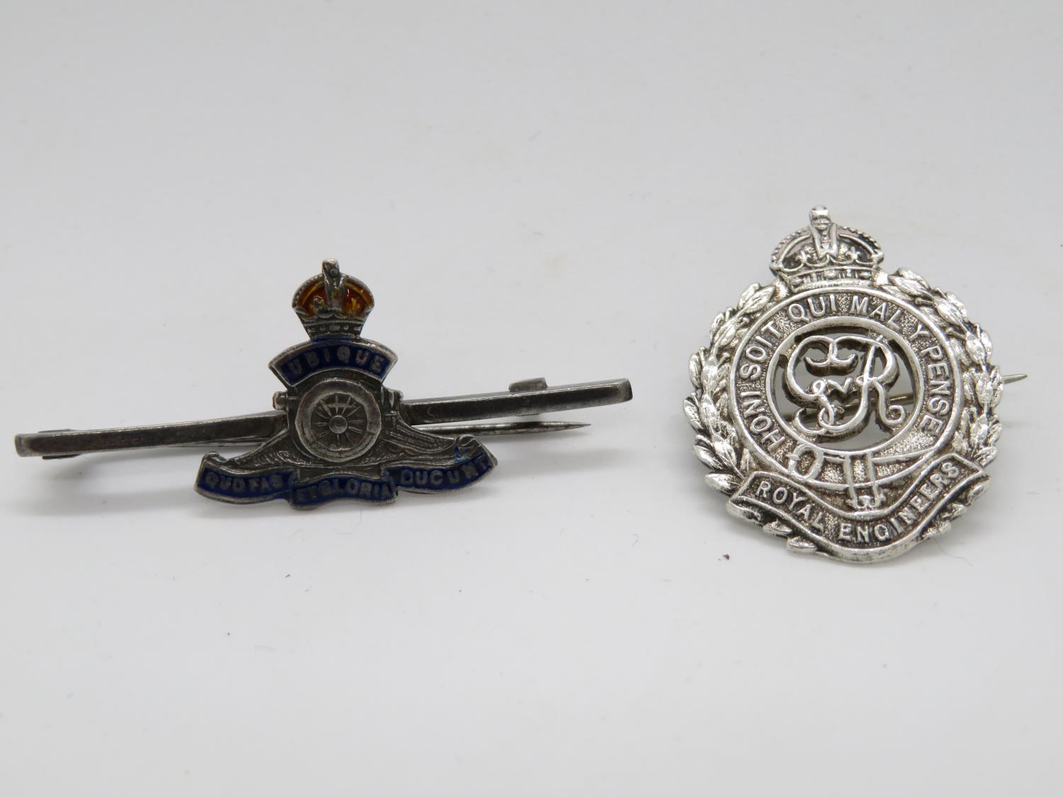 2x silver Military badges