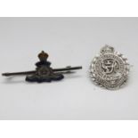 2x silver Military badges