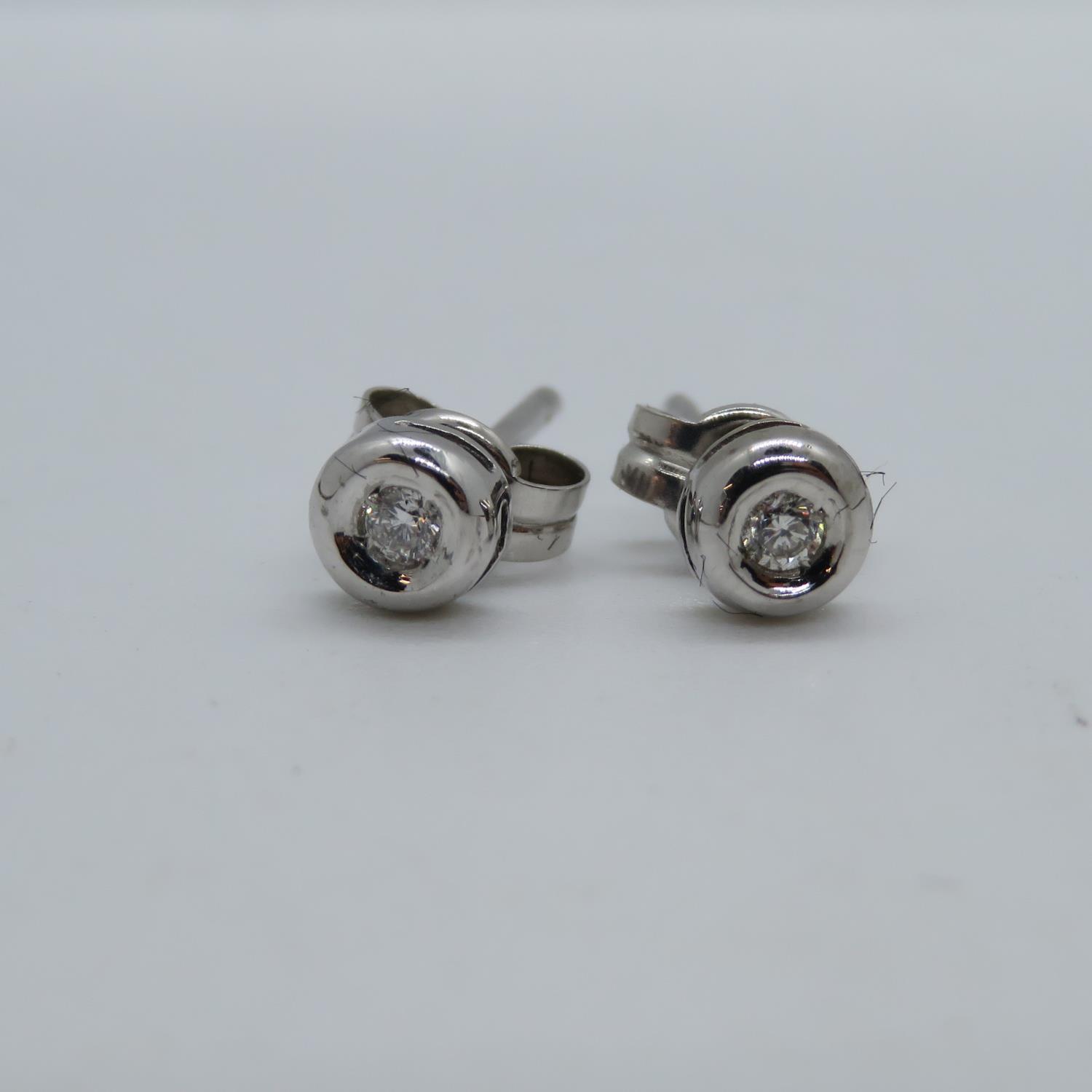 Pair of 9ct white gold and diamond earrings - Image 2 of 2