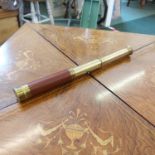 A 19th-century Victorian mahogany and lacquered brass three drawer telescope.