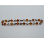Silver bracelet set with Baltic amber