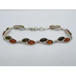 Silver bracelet set with Baltic amber