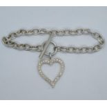 HM silver Tiffany style bracelet with toggle and heart fastener