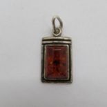 Silver and amber pendant