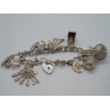 Silver charm bracelet 10x charms 36g