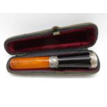 Amber and silver cheroot holder in case