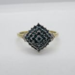 9ct gold Hallmarked ring set with approx .5ct blue and white diamonds size P 2.5g