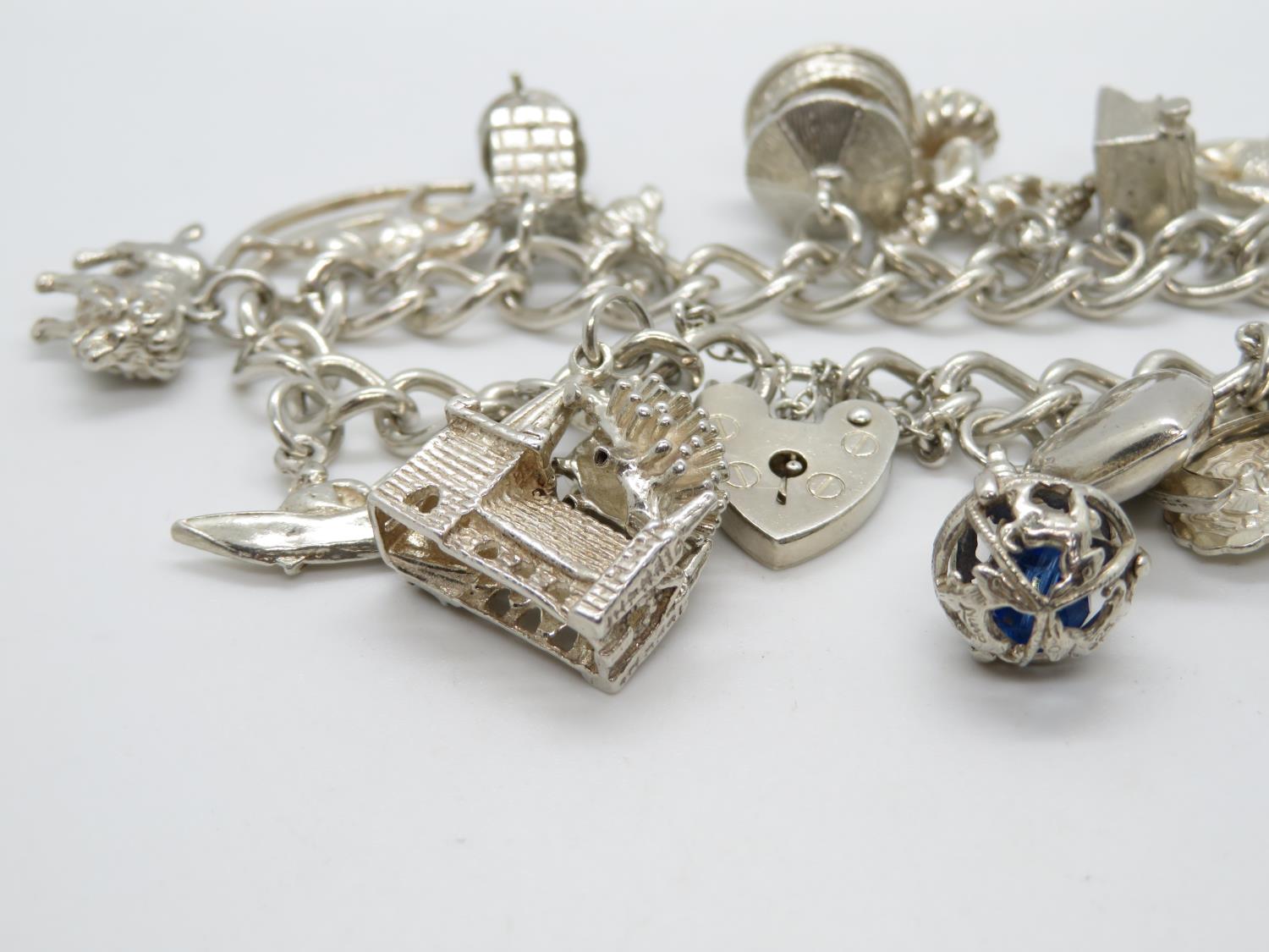 Silver charm bracelet London 1978 20 charms - Image 2 of 2