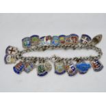 Charm bracelet with enamelled name place badges 36g