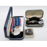 National Service medal along with some RAF cufflinks and British Legion badges