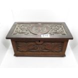 Highly decorated carved box with misc. pieces of jewellery 12" x 7"