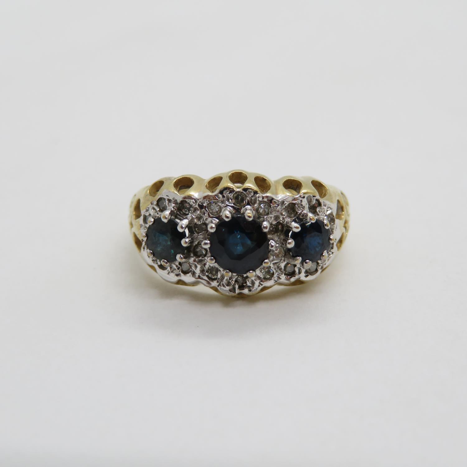 HM 9ct triple floret ring set with sapphires and diamonds size L 4g